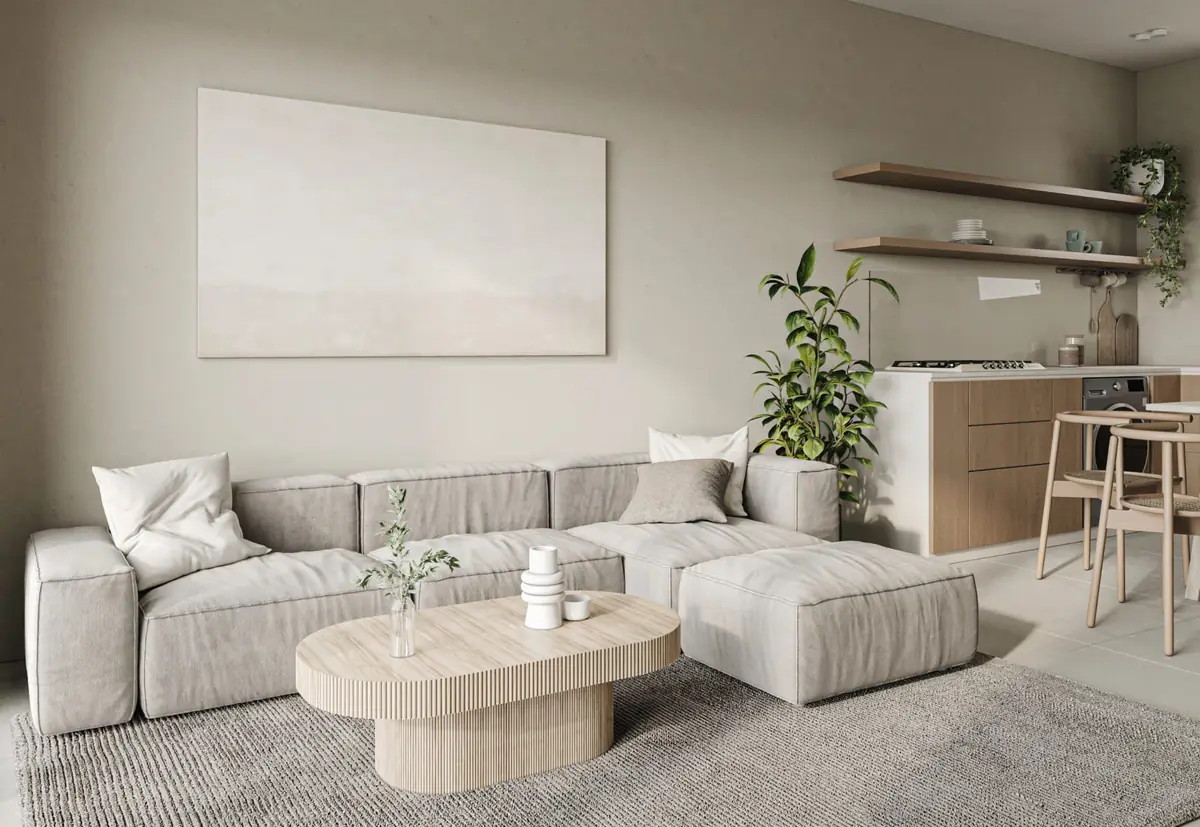 Masyaf Ras Al-Hekma – Neutral living room with a linen sectional sofa, oak coffee table and kitchenette