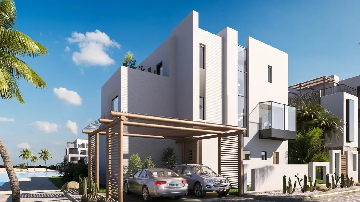 Masyaf Ras Al-Hekma – Corner villa with a timber carport pergola and cacti along the street