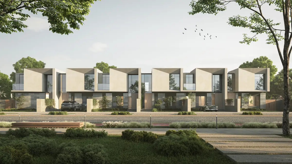 Mist – Row of six townhouses with angled stone frames behind a landscaped verge