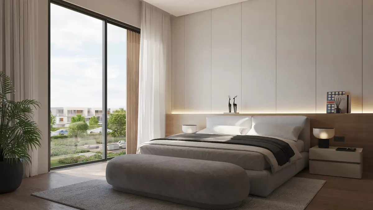 Mist – Bedroom with panelled wall, upholstered bench and full-height window onto greenery