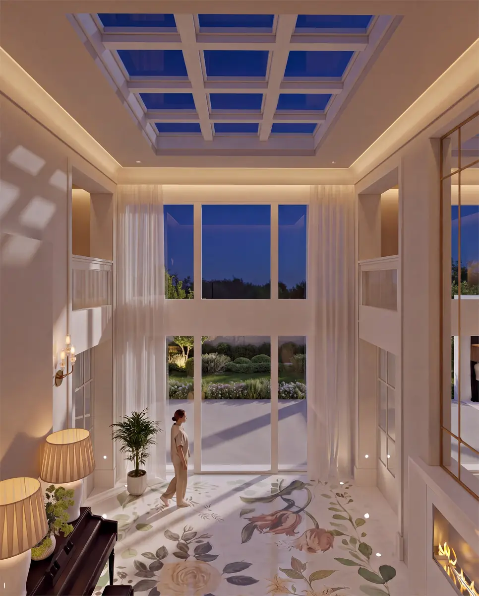 Mr. M.G.'s Palm Hills Villa – Double-height hall at dusk with warm cove lighting and a deep blue skylight