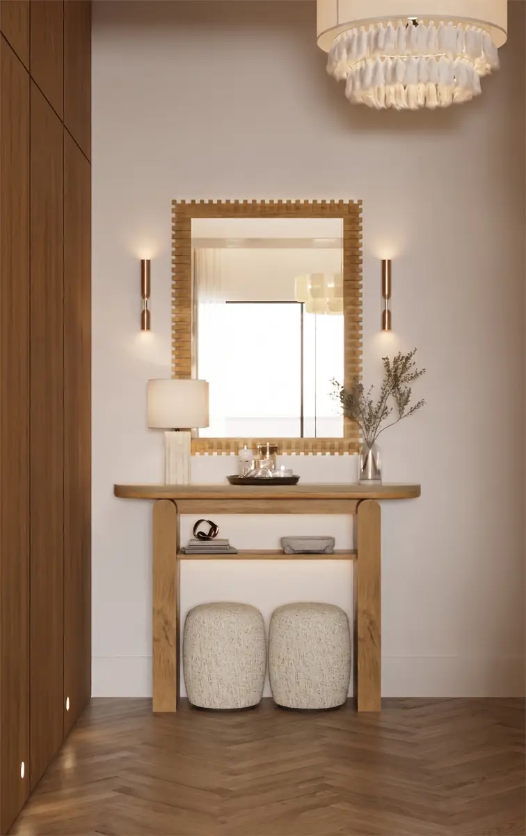 Mrs. A.'s Apartment – SODIC – Entrance console with scalloped mirror, bouclé stools and herringbone floor by day