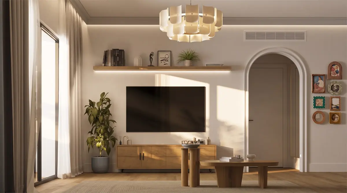 Mrs. A.'s Apartment – SODIC – TV wall with oak sideboard, arched doorway and framed gallery wall in soft daylight