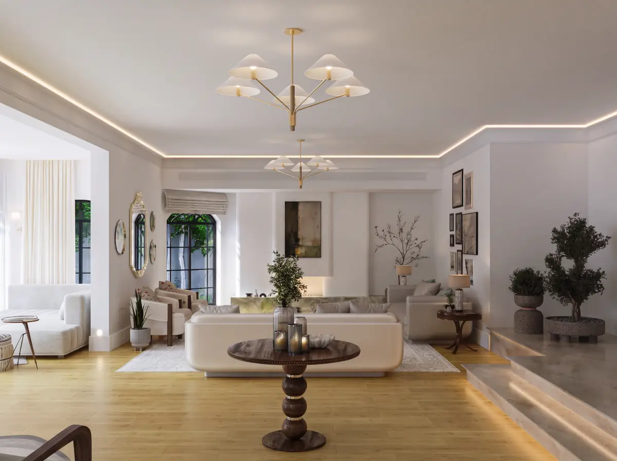 Mrs. S.T.'s Villa – V.24 – Living room with brass chandeliers, cove lighting and marble steps to a raised level