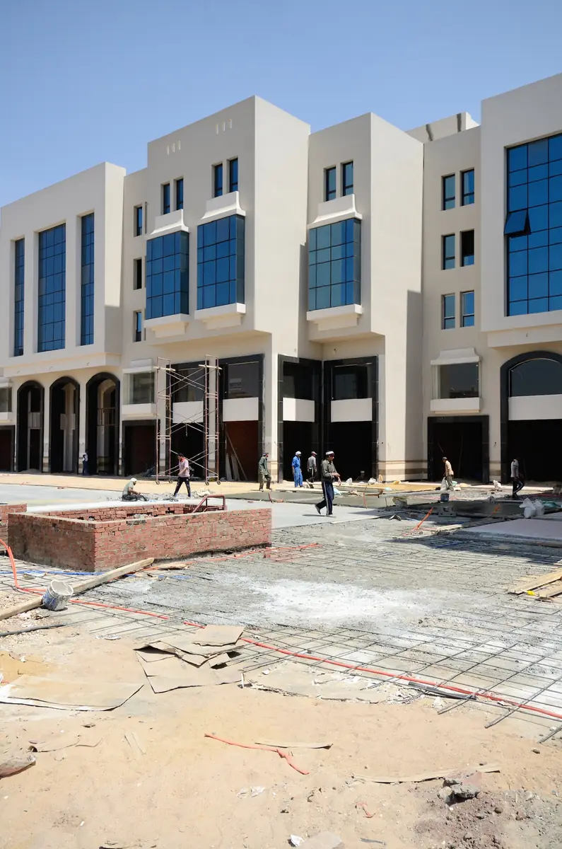 Prima Vista – Medical Office & Commercial Mall – Site during construction, with the arcade complete and the plaza being paved
