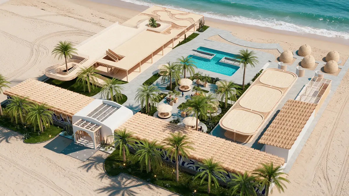 The Spot – Kite Center – Aerial view of the beachfront club with pool, dome cabanas and palms
